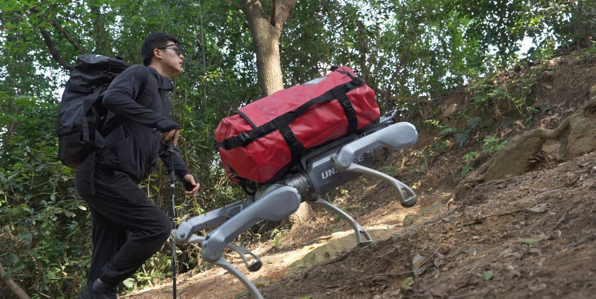 Unitree A2 following a hiker while carrying a bag
